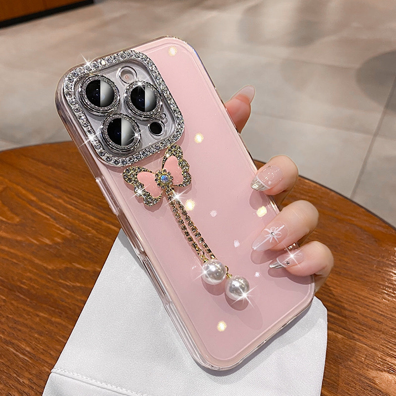 iPhoneケース パール揺れる 蝶々チャーム スマホケース